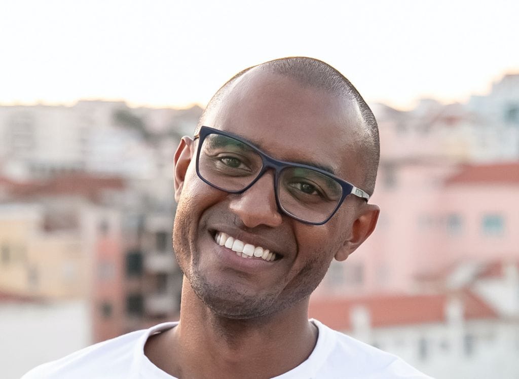 Smiling man with shiny bald head