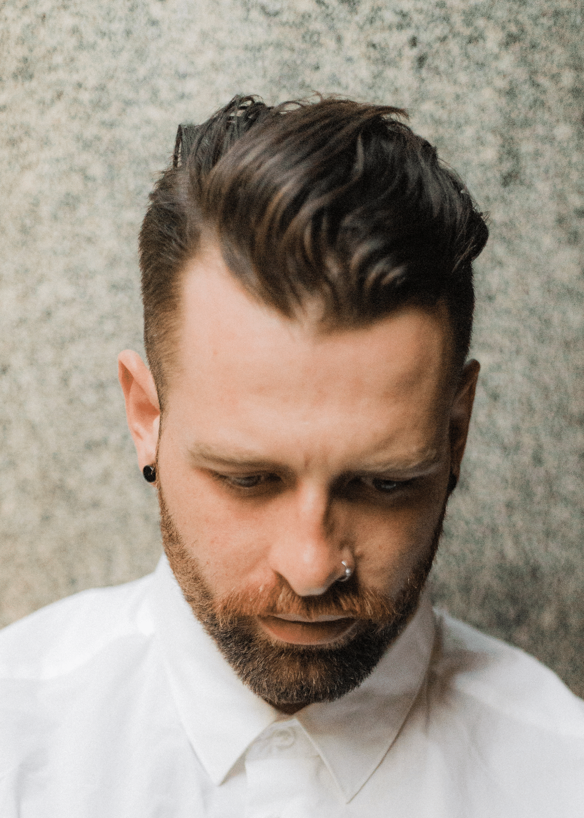 Man with hair styled with water based pomade